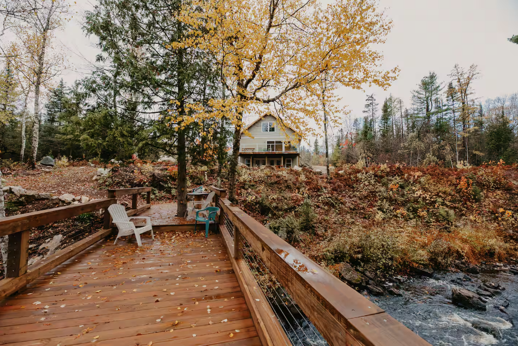 View of the property from the cute little bridge