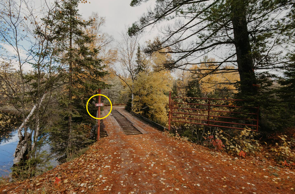Red-gated bridge with 410 sign